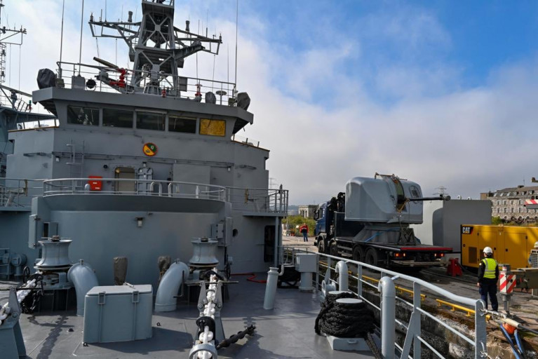 Naval Service Basin: Main arnament of the LE Eithne,  a Bofors 57mm Gun after receiving essential maintenance awaits on a truck-trailer before crane-mounted operation to reinstall on board at the fo'c'sle, i.e in front of the bridge overlooking the bow. 