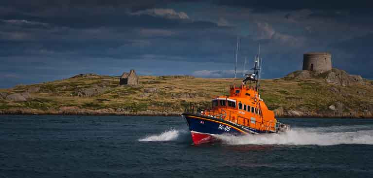 Dun Laoghaire&#039;s RNLI All weather lifeboat passes Dalkey Island on Dublin Bay