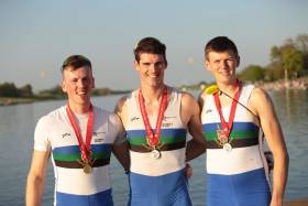 Tiernan Oliver, Philip Doyle and Nathan Hull show off their medals. 