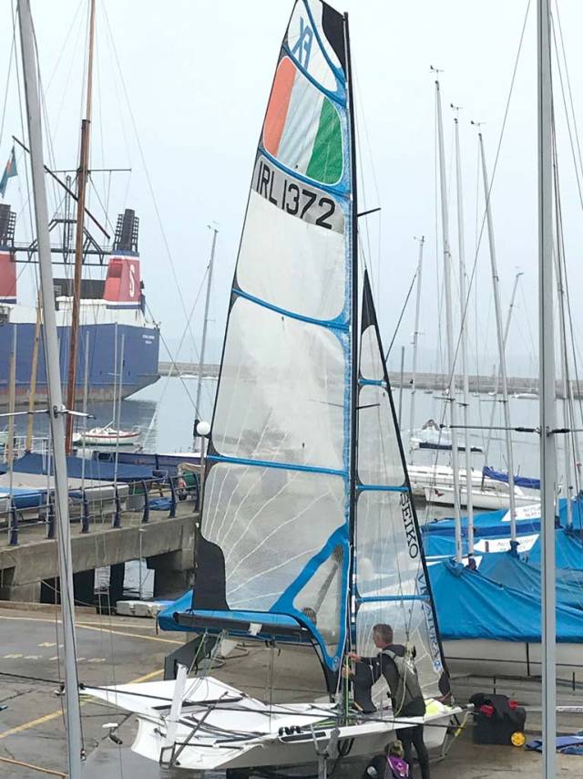 Annalise Murphy's coach Rory Fitzpatrick rigs a women's 49erFX Olympic skiff dinghy at the National Yacht Club in Dun Laoghaire today