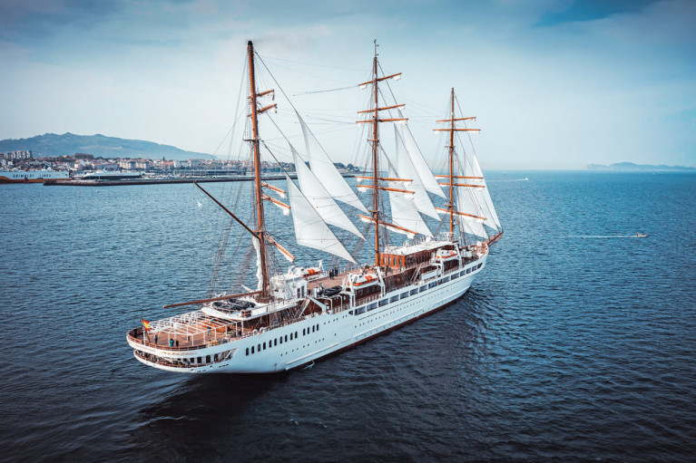 New cruise tallship, Sea Cloud Spirit is to be christened in a naming ceremony by a member of the Spanish royal family next month using blessed pilgrimage champagne from Santiago de Compostela. The building of a three-mast full-rigged ship with traditional rigging in the 21st century may seem a little unusual but for operator, Sea Cloud Cruises, it is a commitment to true passion for sailing. The vessel&#039;s fine lines includes an entire deck with balcony cabins, an exclusive wellness and SPA area, a fitness room with sea view, a bistro on deck as an evening alternative to fine dining in the restaurant. 