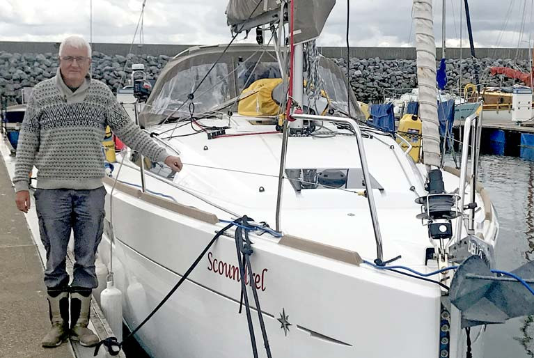 Author Dublin Bay sailor John Latham and Scoundrel at Fenit Marina in County Kerry