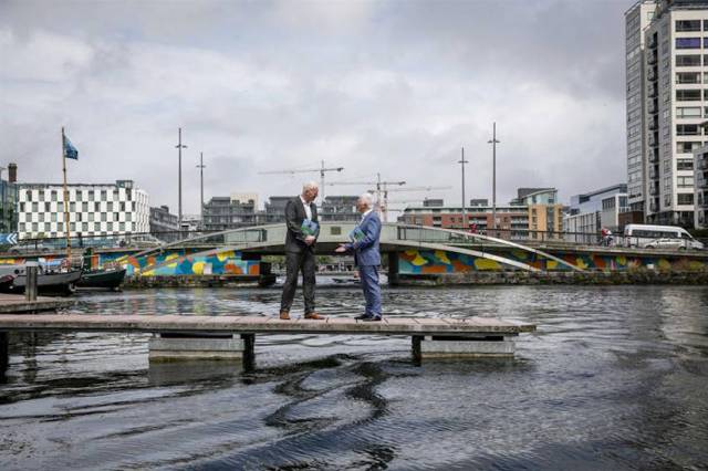 Fáilte Ireland chief Paul Kelly greets Waterways Ireland acting CEO John McDonagh at the latter’s office at Dublin’s Grand Canal Quay