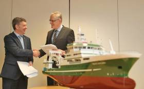 Marine Institute chief executive Dr Peter Heffernan shakes hands with Hans Ove Holmoey, managing director of Skipsteknisk AS, at the signing of the design contract for Ireland’s latest marine research vessel
