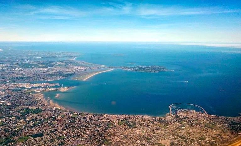 Dublin Bay - playground, workspace, living area and complex ecosystem. With Dublin Port to the left and Dun Laoghaire Harbour on right, the sporting challenges of best utilising Dublin Bay's uniquely balanced potential have been successfully met by Dublin Bay Sailing Club