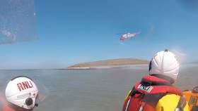 Rescue 116 dropping an additional salvage pump on Colt Island