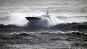 Rising Sea Levels: A pilot cutter in rough seas off the Irish coast which have risen 7cms alone since early 1990&#039;s. The next 5-15 years are critical to act if we are to stop &#039;permanent&#039; damage to the planet