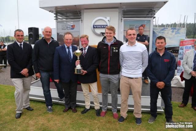 Paul Gibbons of Anchor Challenge receiving the IRC European Championship Trophy from RORC Commodore Michael Boyd