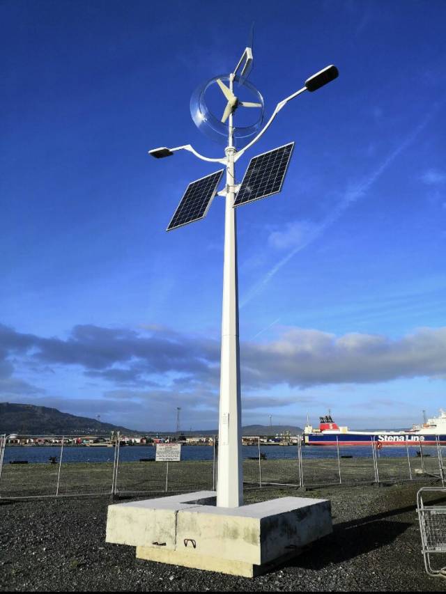 One of the new solar and wind powered light installed in Belfast Harbour, where AFLOAT adds above on the opposite bank of the Lagan is berthed freight-only Stena Forerunner. Last year the ro-ro ship was transferred from North Sea service onto the Belfast-Birkenhead (Liverpool) route.