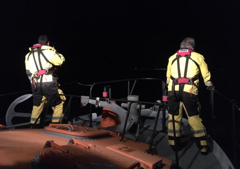 Arklow RNLI volunteer crew look for signs of distress under searchlights on Saturday night