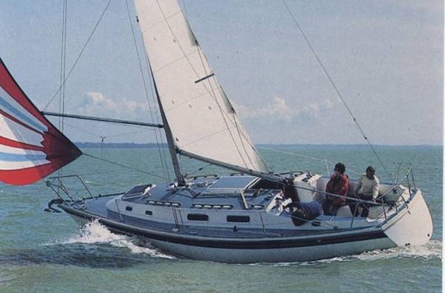 The comfortable yet efficient cruising capacity of the Westerly Fulmar is indicated by the ease with which she can carry a spinnaker while reaching without being heavy on the helm