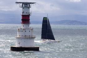Round Ireland Record bid – MOD 70 Phaedo3 takes off at the Kish Lighthouse on Dublin Bay this afternoon