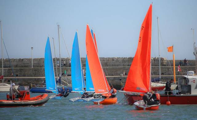 An umpire (in RIB, left) observes a start line at the Elmo Cup Team Racing Competition in Dun Laoghaire