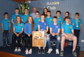 Proud Commodore Steven Kirby and club coach Debbie Hannah (back row) with the victorious East Antrim BC junior and youth squad with the prestigious &#039;Top Club&#039; trophy won at the recent RYA-NI Youth Championship