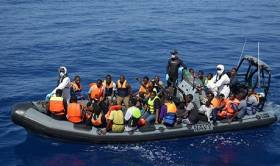 Migrants rescued in an operation that included recovery of bodies from a pair of rubber craft off Libya