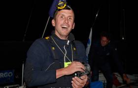 Bird in the hand - Tom Dolan arrives on the dock with a feathered friend in Roscoff last night after another tough leg of the Figaro Race