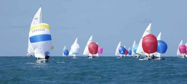 The National Yacht Club's Charles Apthorp and Alan Green (closest red spinnaker above) were third in the penultimate race in New Zealand yesterday 