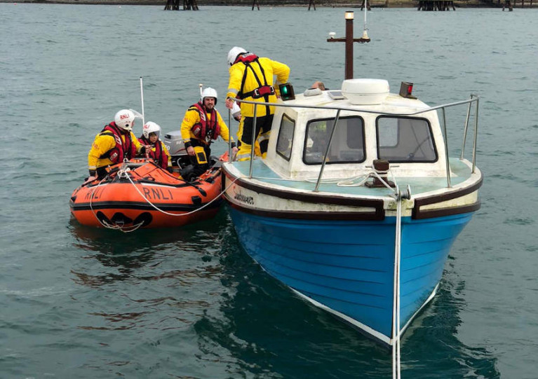 Larne RNLI’s crew sets up an alongside tow for the casualty boat