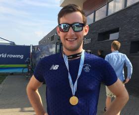 Paul O&#039;Donovan with his gold medal in Rotterdam today. Scroll down for video