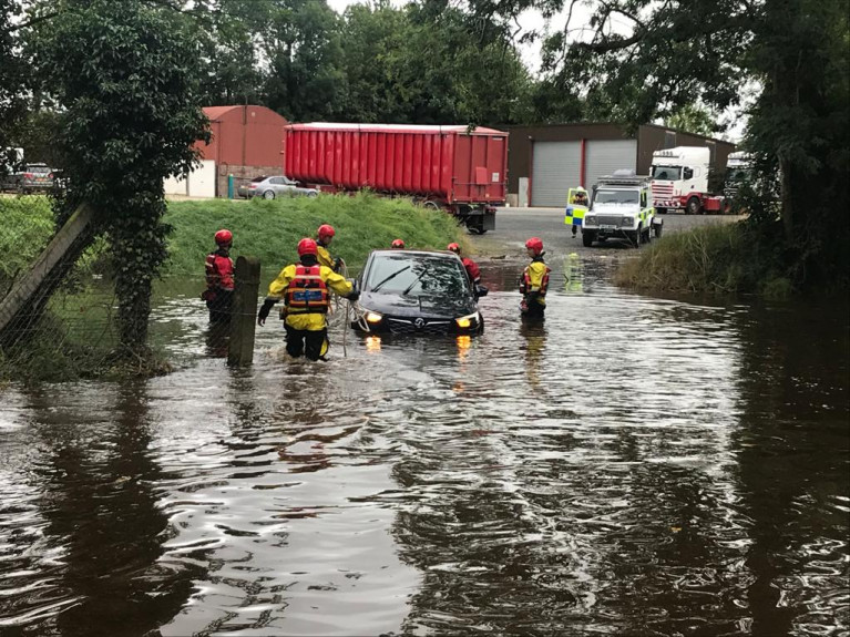 Rescue teams attend flooded streets in Newcastle after Storm Francis