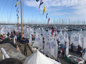 The RIYC Optimist Nationals Fleet prepare to launch on Day two