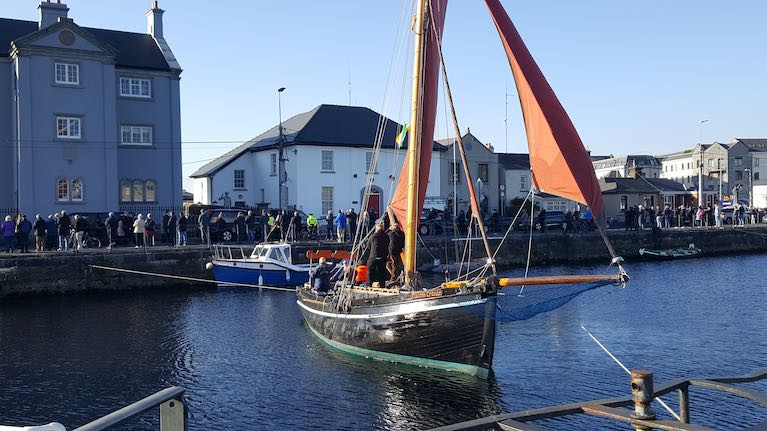A Galway hooker crew paying respect to Martin and Tom Oliver and their bereaved relatives at Claddagh church