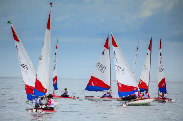 Topper dinghies reach a weather mark in the first day of racing for the class at the Irish Sailing Youth Pathway National Championships