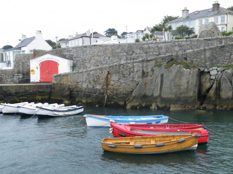 The passenger ferryboat service to Dalkey Island in south Dublin Bay is not operating following the partial collapse of the cliff within Coliemore Harbour resulting in the closure of the harbour' s access walkway path to the ferry-pier and the Dalkey Rowing Club boathouse (also above) due to health and safety grounds. On the right can be seen the gap where a large rock became dislodged, dropped directly into the water below. 