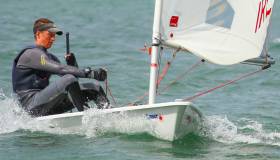 Howth&#039;s Ewan McMahon won a qualifying race in the blue fleet at the KBC Laser Radial World Championships in Dun Laoghaire today