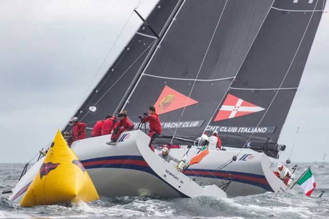 Royal Cork get the inside berth for Ireland at a leeward mark rounding in an action packed day three of the New York Invitational Cup 
