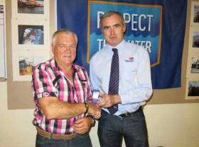 Mattie Stafford left, pictured with Declan Dixon from the RNLI when he received his 20 years Long Service Medal in recognition of his time spent on the lifeboat crew