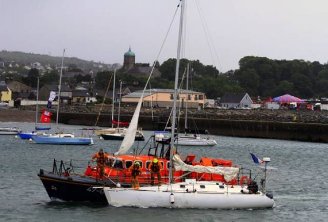 Wicklow's all-weather lifeboat towing the stricken yacht into Wicklow Harbour