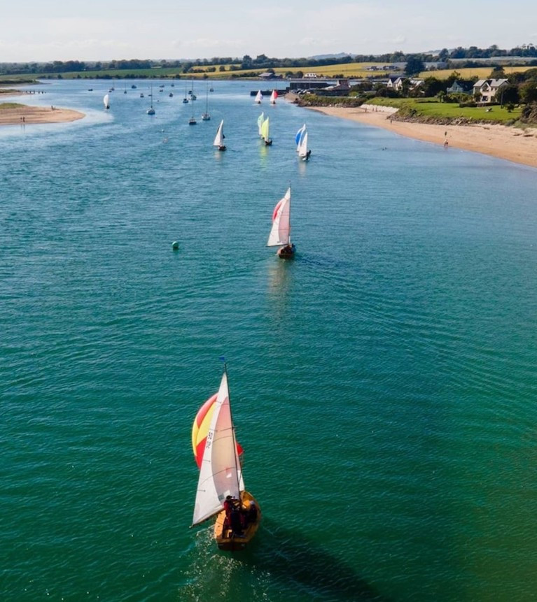 Aerial drone image of the Mermaid fleet on the way back to Rush Sailing Club