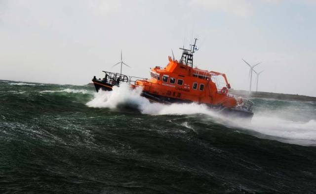 Once on scene the lifeboat crew checked that the two onboard were safe and well before attempting to tow the vessel off the rocks
