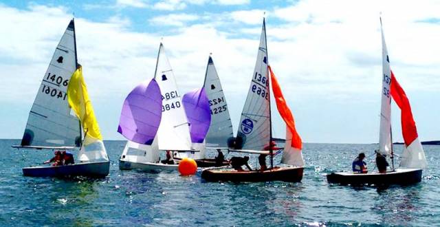GP14s negotiate a gybe mark at Skerries during the Leinster Championships