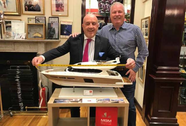 Made to measure – Dublin Tailor Louis Copeland (left) runs a rule over Gerry Salmon's new Prestige model that the Dublin Boat dealer is exhibiting in Southampton this week