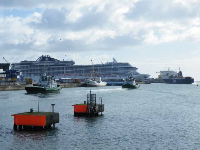 The massive cruiseship MSC Splendida compared to a P&O Ferries vessel preparing to berth in Dublin Port
