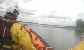 Portaferry’s inshore lifeboat arrives on scene to rescue the women and children cut off by the tide