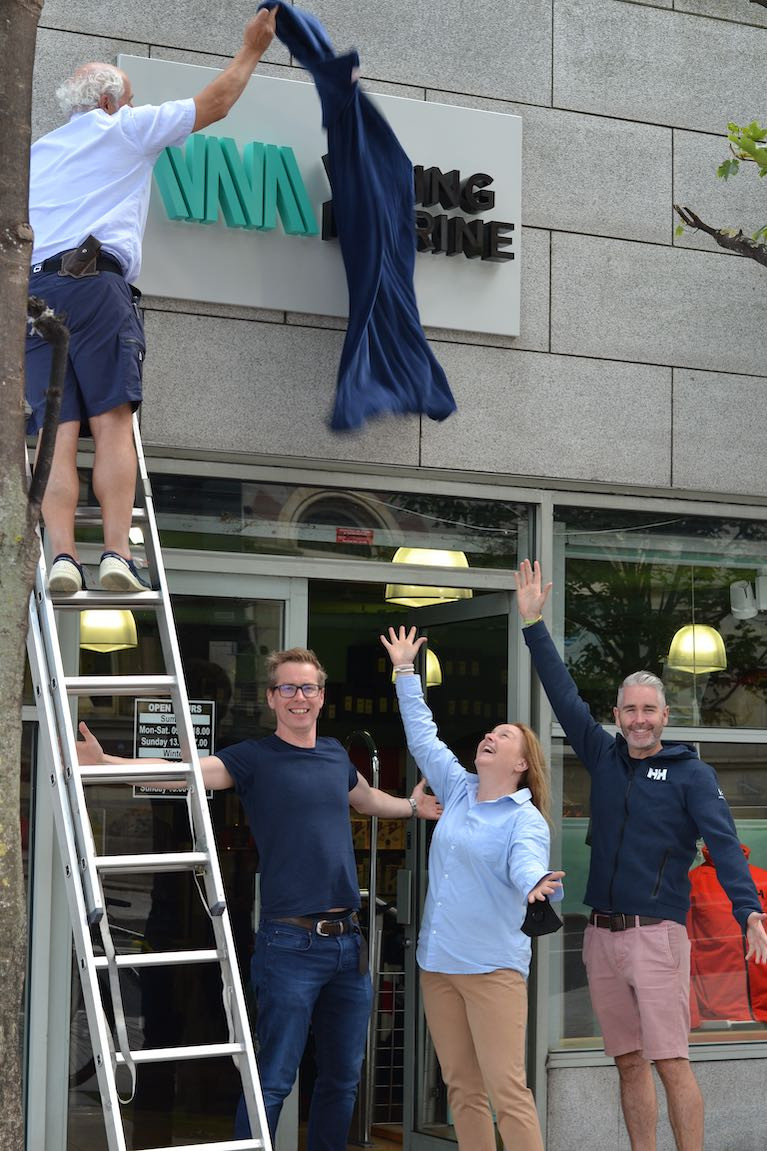 Ian O&#039;Meara (on ladder) unveils the new logo at the Viking Marine store at the Pavilion in Dun Laoghaire Harbour with Gerard Whelan, Brand Central Design who created the new brand, Antonia O Rourke Viking Marine, Paddy Kirwan of Helly Hansen