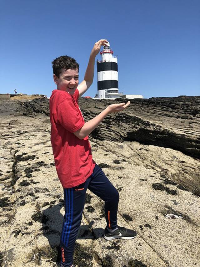 Gar Heffernan holding the winning image of Hook Head (Lighthouse) Co. Wexford, the scene captured the essence of summer fun at our lighthouses. 