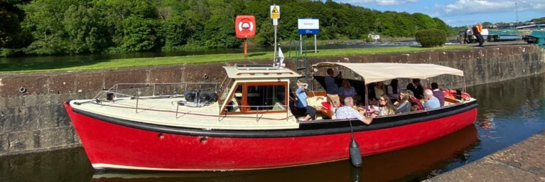 River at your leisure... guests on board MV Kingfisher on the River Bann, which is operated by the 75 year old veteran vessel built by Harland &amp; Wolff