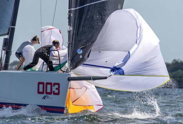 Anthony O'Leary's Royal Cork crew gather the spinnaker on the bow of their IC37 in the penultimate race of the 2019 Rolex New York Yacht Club Invitational Cup