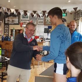 Jack Dorney is presented with his prize by Pat Hickey.