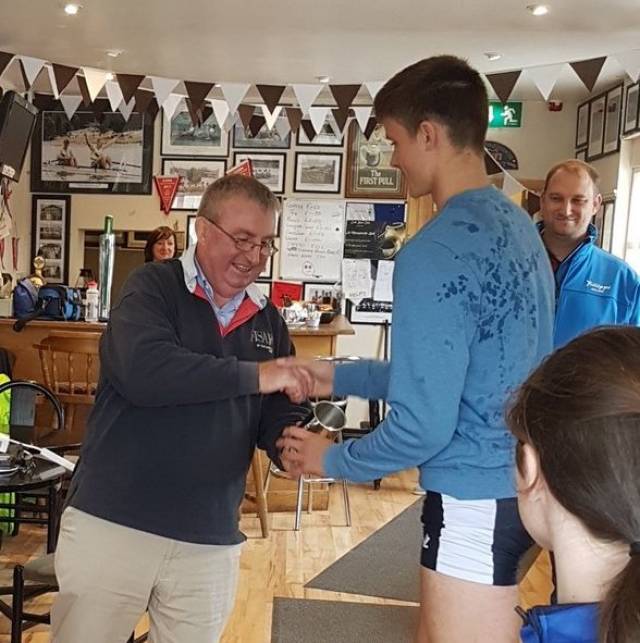 Jack Dorney is presented with his prize by Pat Hickey.