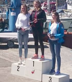Aoife Hopkins (centre) was overall winner of the women&#039;s Laser Radial Europa Cup fleet last weekend  in Holland. The Howth youngster was best under–19 too. It wasn&#039;t the only Dutch performance from the Irish youths either, Liam Glynn was third in the under–19 boys fleet.