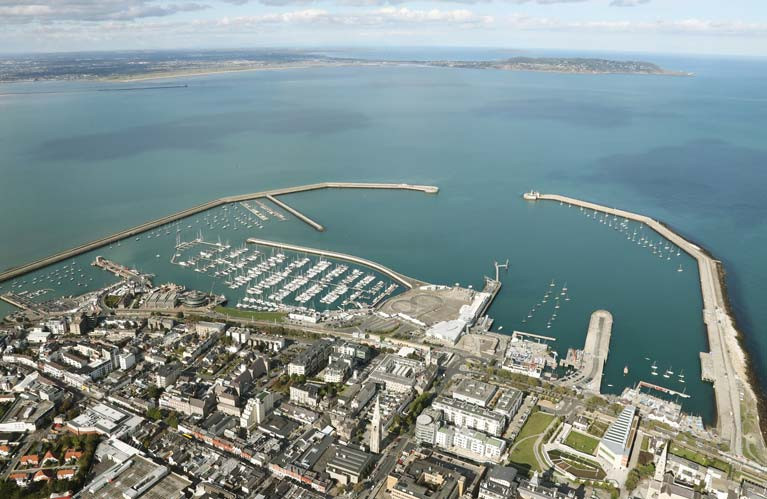 A town and its harbour. From a height, Dun Laoghaire and its harbour may look to be dynamically inter-twined. But at sea level, things can be very different.