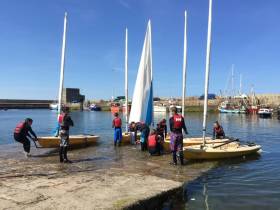 The Irish Youth Sailing Club launching in better times from Dun Laoghaire’s West Pier