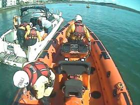 Youghal’s lifeboat crew helps pump out water from the vessel moored in Youghal Harbour