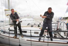 Dubliners Liam Coyne and Brian Flahive on First 36.7 Lula Belle celebrate their victory in Cowes after the 2014 RB&amp;I
