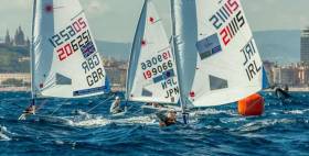 Howth Yacht Club&#039;s Aoife Hopkins leads the fleet around the Weather mark in race two of the Laser European Championships in Barcelona